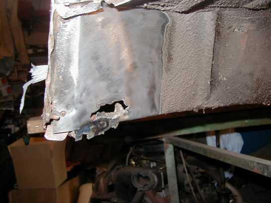 Picture 3 Revealed rust on the rear end of the rocker panel